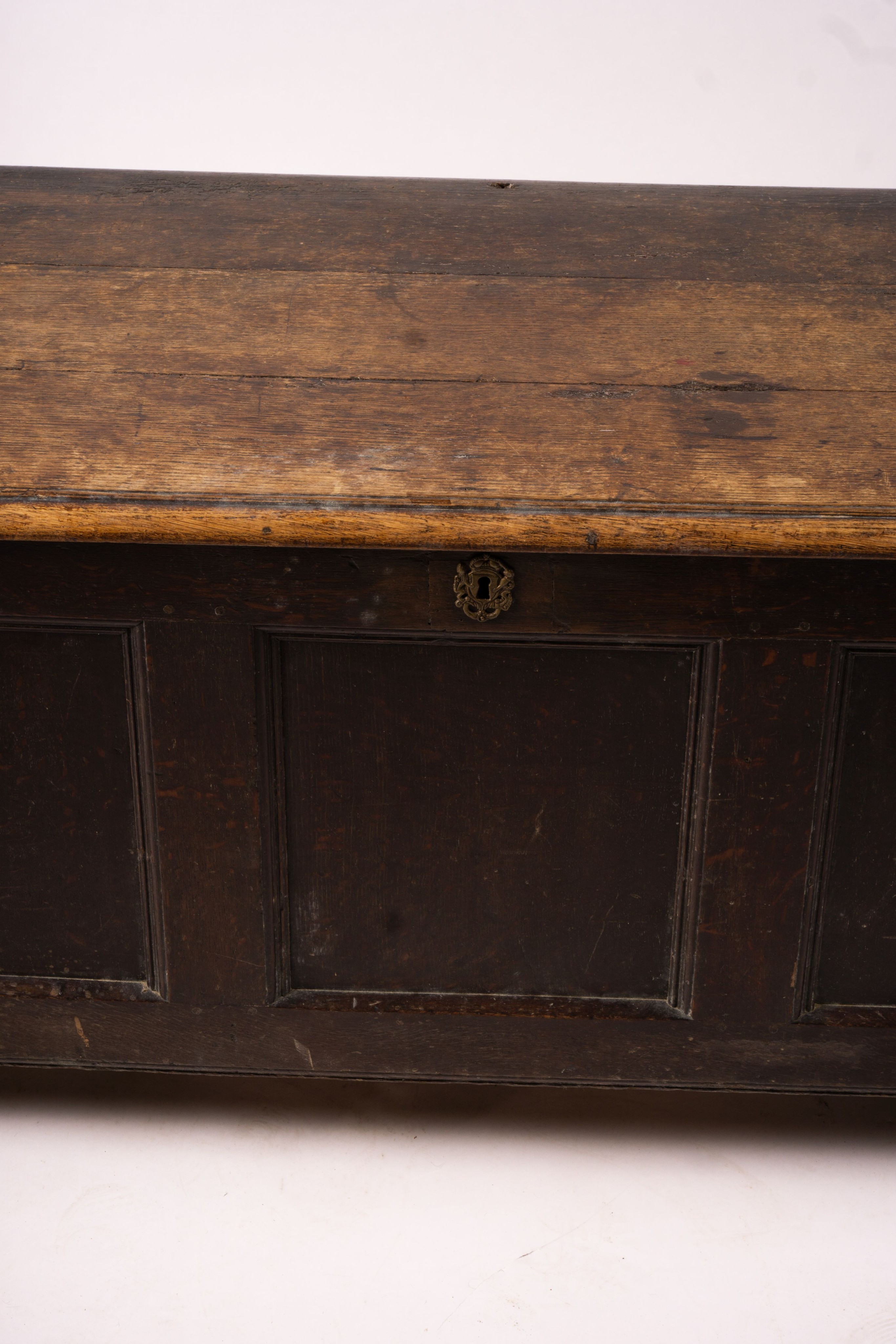 A 17th century panelled oak coffer, length 136cm, depth 56cm, height 64cm